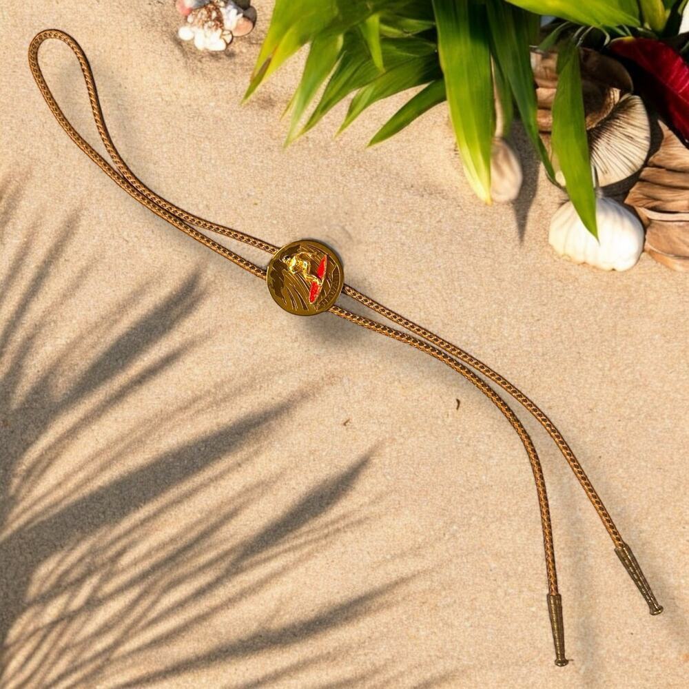 Vintage Hawaiian Bolo Tie Mens Coastal Cowboy Brass 3D Medallion Fabric Chord